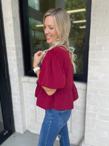 Center Stage Burgundy Bow Detail Top