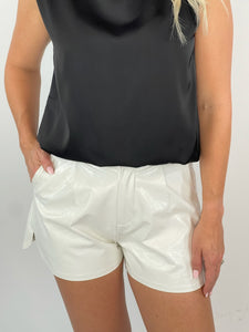 Living It Up Off White Faux Leather Shorts